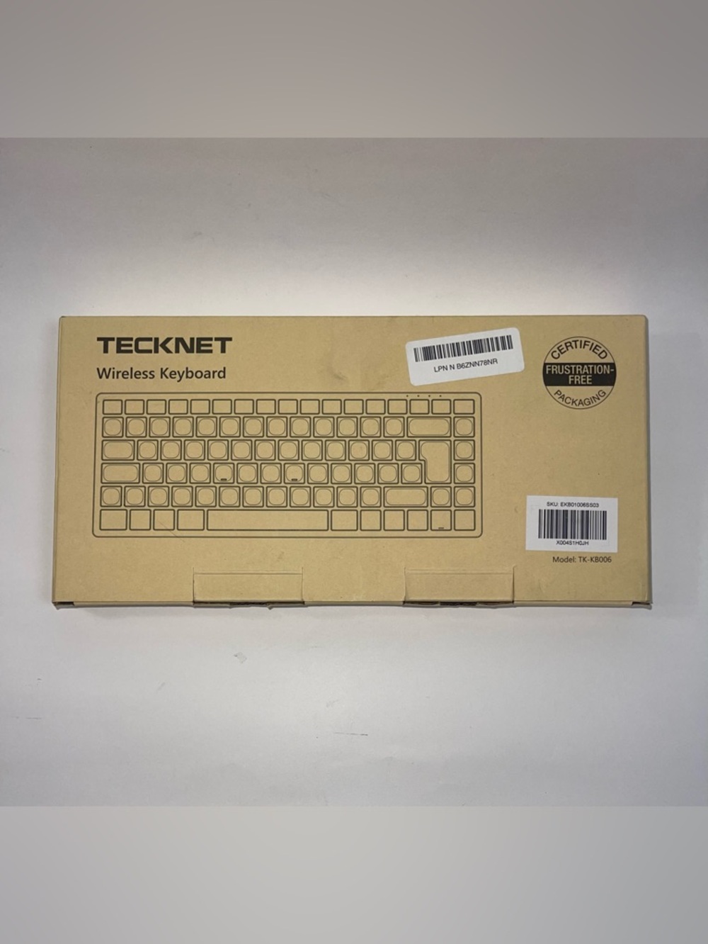 Wireless Keyboard in Brown Packaging